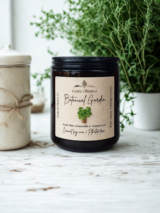Candle jar labeled 'Botanical Garden' on a wooden surface with plants in the background